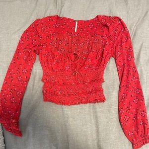 Free People Lolita smocked top. Red floral. Size XS.